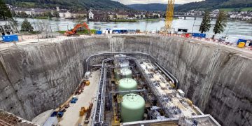 A pit the size of two football fields was dug to install the world's most powerful battery