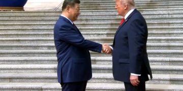 Trump and Xi Jinping share historic handshake at the Great Hall of the People