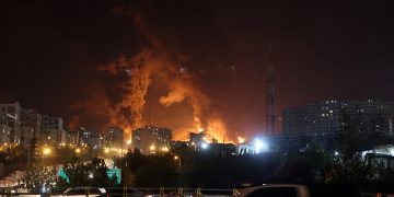 America and Iran attack each other