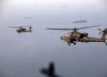 The Strait of Hormuz has become a battlefield, with an American helicopter destroyed in an Iranian attack.