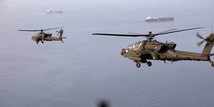 The Strait of Hormuz has become a battlefield, with an American helicopter destroyed in an Iranian attack.