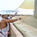 Where do the pebbles thrown by pilgrims go