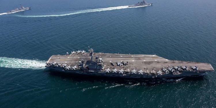 Advanced US naval strike group redeployed from near China to the Middle East.