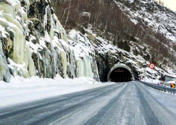 Building a tunnel under the snow-capped mountains