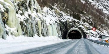 Building a tunnel under the snow-capped mountains
