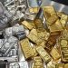 Gold price drops, silver price rises.
