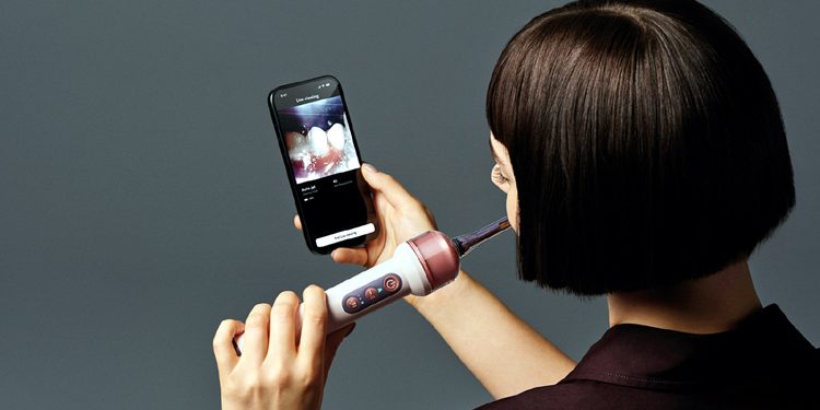 Toothbrush or camera The world is amazed by a new invention.