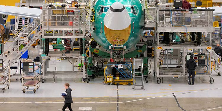 How many passenger aircraft is Boeing manufacturing each month
