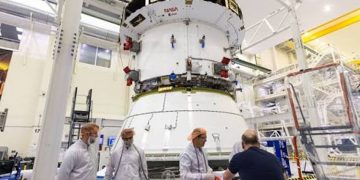 Preparations for NASA's Artemis III moon mission accelerate, rocket boosters and four engines installed